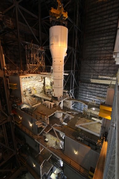 Another view of the Ares I-X being assembled. Credit: NASA