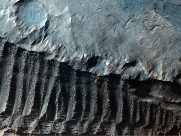   Eroded Craters and Sharp Ridges  Credit: NASA/JPL/University of Arizona