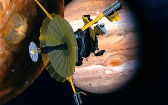Artist's concept of the Galileo space probe passing through the Jupiter system. Credit: NASA