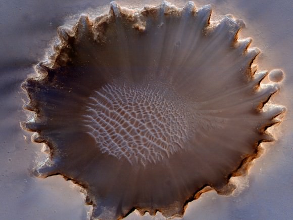 An Oblique View of Victoria Crater. Credit: NASA/JPL/University of Arizona