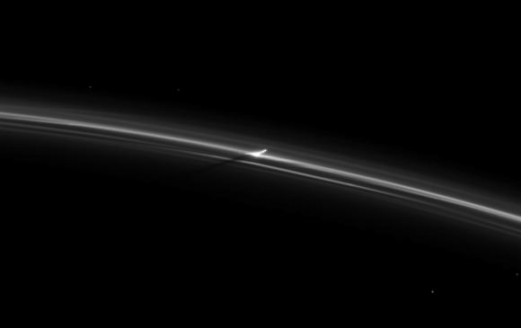 Something blasts through Saturn's F Ring. Credit: NASA/JPL
