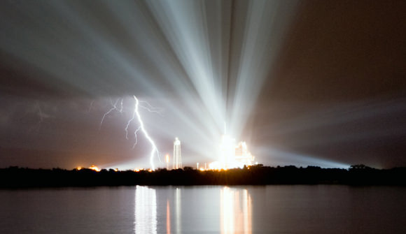 Lightining strikes close to Discovery on the launchpad on Aug. 25, 2009. Credit: NASA/Ben Cooper.  Click image for access to larger version.