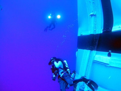 Divers recover the Ares I-X booster. Credit: NASA, via Spaceflightnow.com