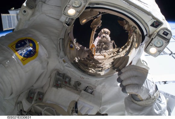 Mike Foreman looks at his spacewalking partner Randy Bresnik.  Credit: NASA