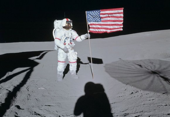 Shepard poses next to the American flag on the Moon during Apollo 14. Credit: NASA