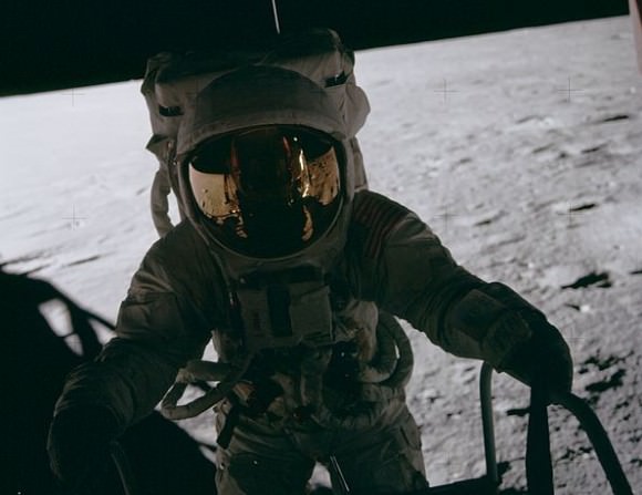 Pete Conrad descends from the Lunar Module (LM). Credit: NASA