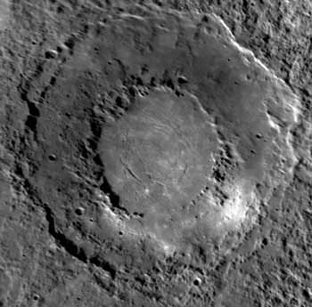 This spectacular 290-km-diameter double-ring basin seen in detail for the first time during MESSENGER’s third flyby of Mercury bears a striking resemblance to the Raditladi basin, observed during the first flyby. 