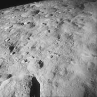 Image taken through Apollo 8 window while passing over the lunar surface.