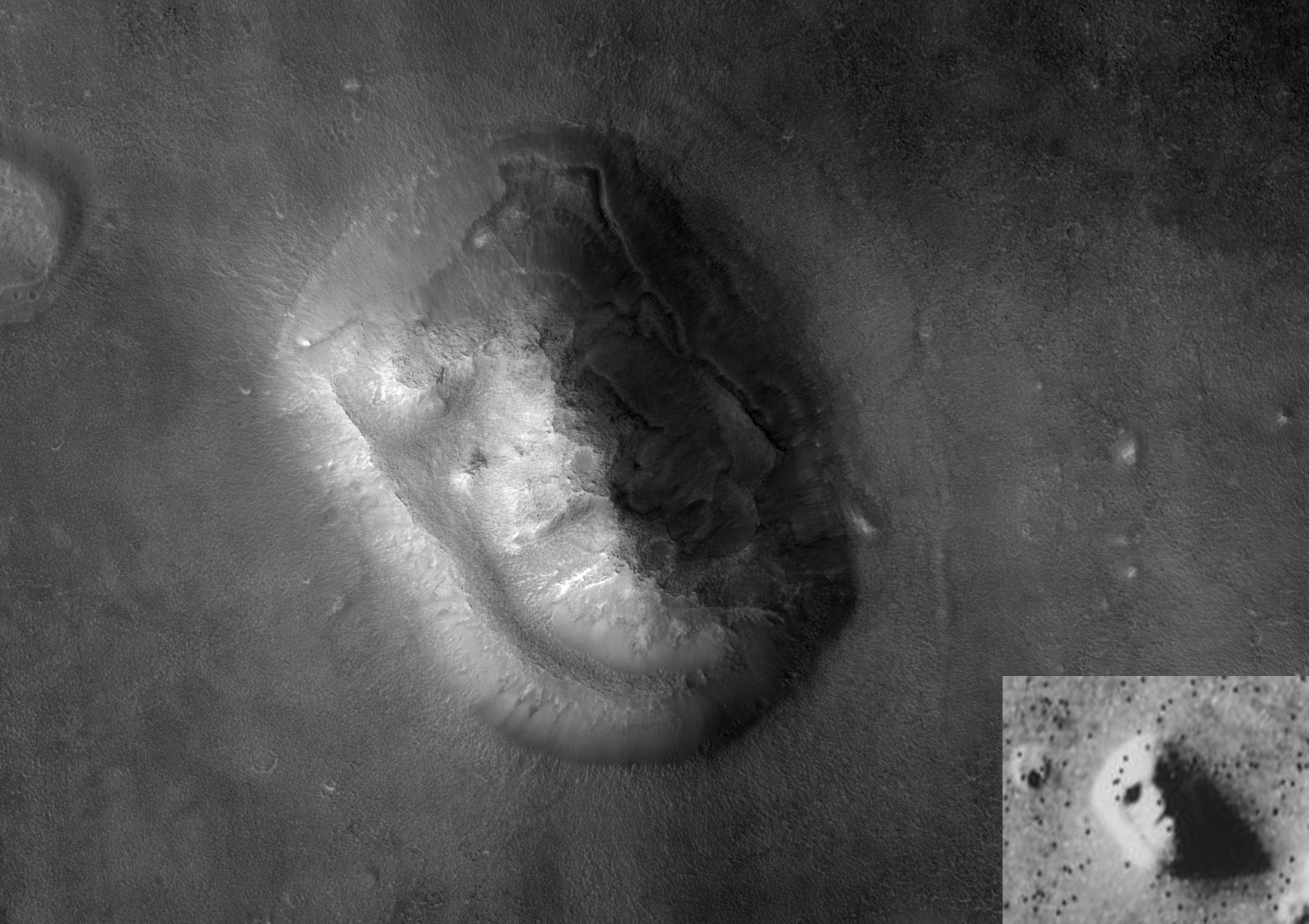 Image of the "Face of Mars" by the Mars Reconnaissance Orbiter, with the Viking 1 image inset (bottom right). Credit: NASA/JPL