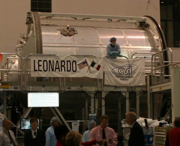 Leonardo’ MPLM module inside the Space Station Processing Facility at KSC built by Alenia under contract to ESA and the Italian Space Agency (ASI).  This module will be left attached to the ISS on the last scheduled shuttle mission, STS 133. It will be modified with additional shielding for protection against strikes by micrometeoroids. Note grapple fixture at top. Each MPLM is 21 feet long, 15 feet in diameter, weighs 4.5 tons, and can deliver up to 10 tons of cargo to the ISS.  Credit: Ken Kremer