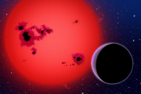 This artist's conception shows the newly discovered super-Earth GJ 1214b, which orbits a red dwarf star 40 light-years from our Earth. Credit: Credit: David A. Aguilar, CfA