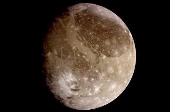 This natural color view of Ganymede was taken from the Galileo spacecraft during its first encounter with the Jovian moon. Credit: NASA/JPL