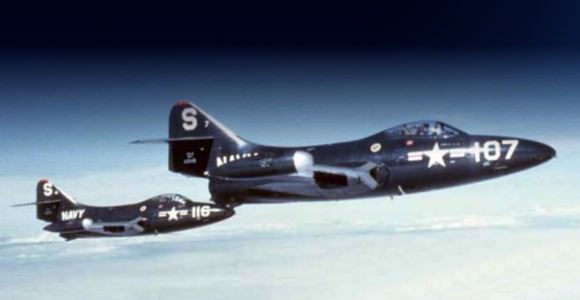 Two F9F-2 Panthers over Korea, with Armstrong piloting S-116 (left). Credit: U.S. Navy National Museum of Naval Aviation 
