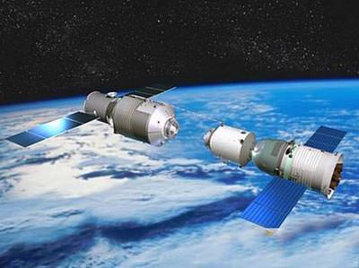 An artist's rendering of the Tiangong-1 module, China's space station, which was launched to space in September, 2011. To the right is a Shenzhou spacecraft, preparing to dock with the module. Image Credit: CNSA