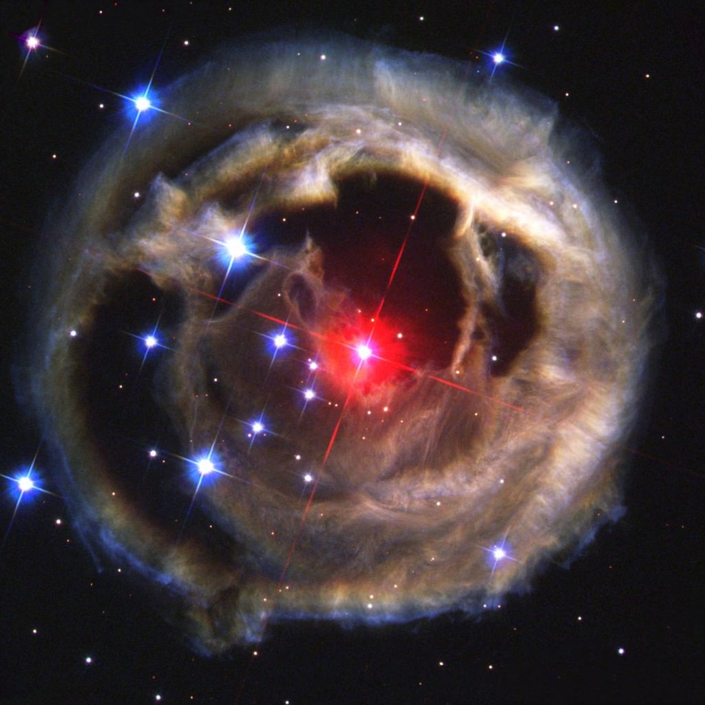 This Hubble Space Telescope image shows the light echo of dust illuminated by nearby star V838 Monocerotis as it became 600,000 times more luminous than our Sun in January 2002. That may have been a mergeburst created when the star merged with and consumed a smaller star. Credit: NASA/ESA