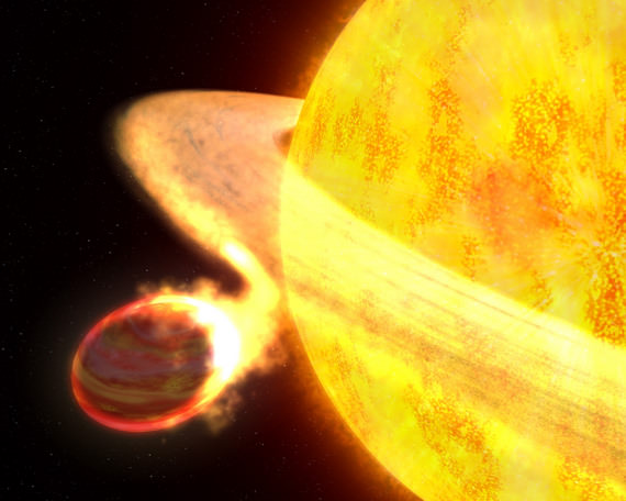 Artist's concept of the exoplanet WASP-12b -- a hot Jupiter being devoured by its parent star. Artwork Credit: NASA, ESA, and G. Bacon (STScI)