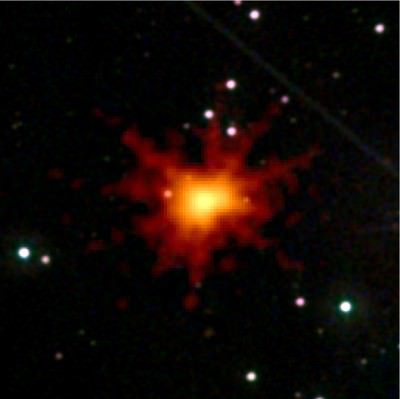 The brightest gamma-ray burst ever seen in X-rays temporarily blinded Swift's X-ray Telescope on 21 June 2010. This image merges the X-rays (red to yellow) with the same view from Swift's Ultraviolet/Optical Telescope, which showed nothing extraordinary. (The image is 5 arcminutes across.) Credit: NASA/Swift/Stefan Immler