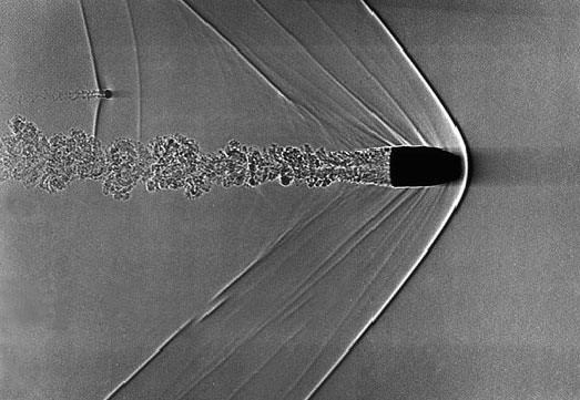 This picture shows a bullet and the air flowing around it, giving visual representation to air resistance. Credits: Andrew Davidhazy/Rochester Institute of Technology
