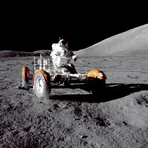 Dust flies from the tires of a moon buggy, driven by Apollo 17 astronaut Gene Cernan. These "rooster-tails" of dust caused problems. Credit: NASA