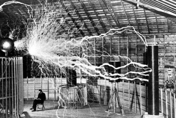  Century Magazine photographer Dickenson Alley) of Tesla sitting in his Colorado Springs laboratory with his "magnifying transmitter" generating millions of volts. The 7-metre (23 ft) long arcs were not part of the normal operation, but only produced for effect by rapidly cycling the power switch.[117]