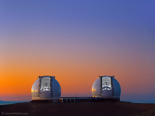 The sun sets on Mauna Kea as the twin Kecks prepare for observing. Will satellite constellations affect the observing activities of telescopes like these? Credit: Laurie Hatch/ W. M. Keck Observatory