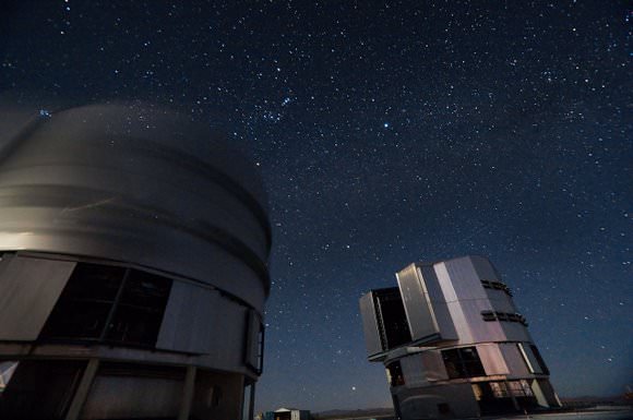 The Very Large Telescope (VLT) at ESO's Cerro Paranal observing site in the Atacama Desert of Chile, consisting of four Unit Telescopes with main mirrors 8.2-m in diameter and four movable 1.8-m diameter Auxiliary Telescopes. The telescopes can work together, in groups of two or three, to form a giant interferometer, allowing astronomers to see details up to 25 times finer than with the individual telescopes. Credit: Iztok Boncina/ESO