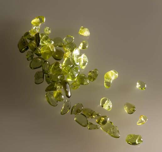 Olivine is a mineral found in Earth's crust and is transformed into anydrous minerals wadsleyite and ringwoodite. Such minerals can store water deep beneath the surface of a planet. Image Credit: Tom Trower