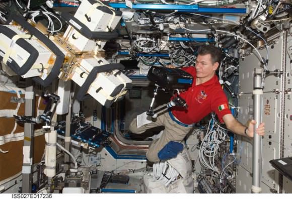 ESA astronaut Paolo Nespoli works with an experiment on board the International Space Station. Credit: NASA
