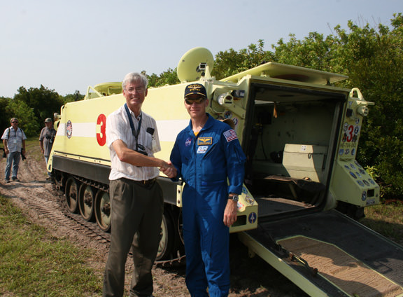 STS-135 Shuttle Commander Chris Ferguson (right) and Ken Kremer (Universe Today) meet at emergency M-113 Tank Practice during crew pre-launch events at the Kennedy Space Center in the weeks before Atlantis July 8, 2011 liftoff. Credit: Ken Kremer- kenkremer.com