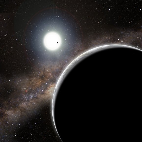 The "invisible" world Kepler-19c, seen in the foreground of this artist's conception, was discovered solely through its gravitational influence on the companion world Kepler-19b - the dot crossing the star's face. Kepler-19b is slightly more than twice the diameter of Earth, and is probably a "mini-Neptune." Nothing is known about Kepler-19c, other than that it exists. Credit: David A. Aguilar (CfA)