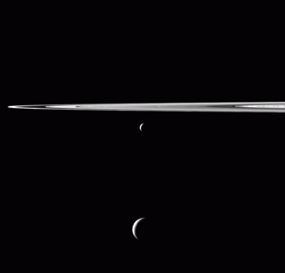 Enceladus and Tethys hang below Saturn's rings in this image from the Cassini spacecraft. Credit: NASA/JPL-Caltech/SS