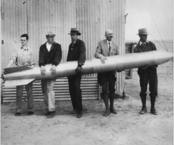 Dr. Robert H. Goddard (second from right) and his colleagues hold a liquid-propellant rocket in 1932 at their New Mexico workshop. Credit: NASA Goddard Space Flight Center