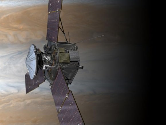 Juno will repeatedly dive between the planet and its intense belts of charged particle radiation, coming only 5,000 kilometers (about 3,000 miles) from the cloud tops at closest approach. (NASA/JPL-Caltech)