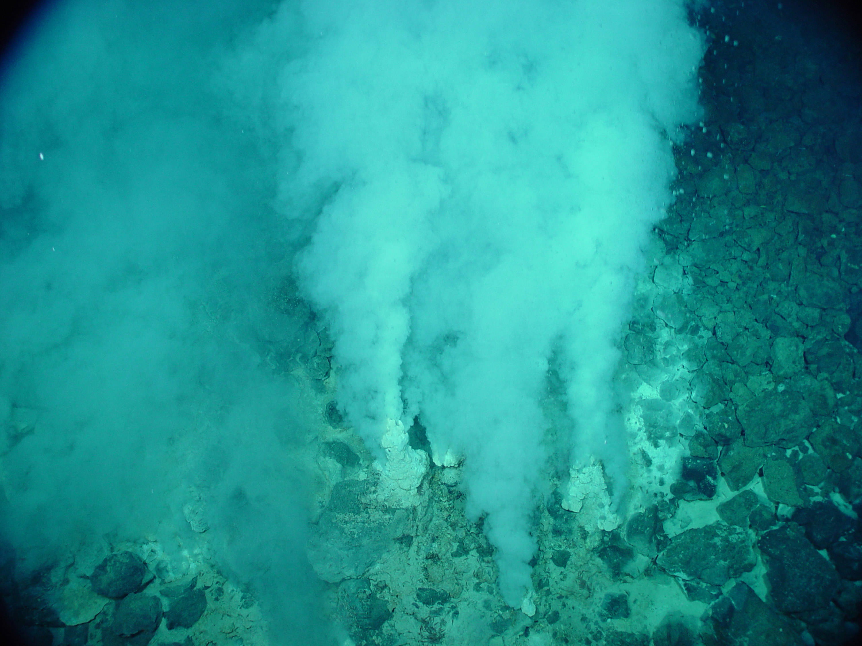 Hydrothermal vents deep in Earth's oceans. Could similar types of vents power the transport of silica and other materials out from Enceladus? Credit: NOAA