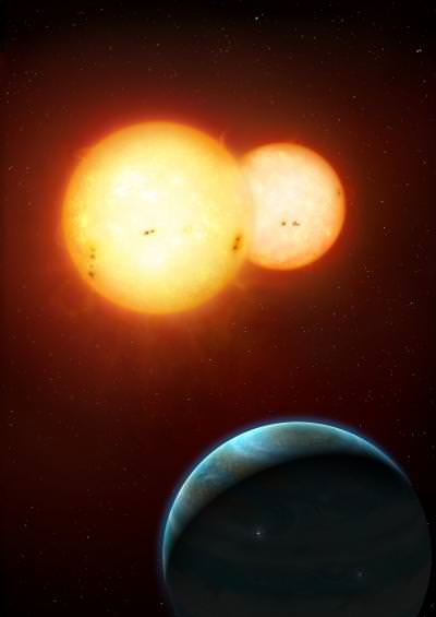 Artist's conception of the Kepler-35 system where a Saturn-sized planet orbits its two stars. Credit: © Mark A. Garlick / space-art.co.uk