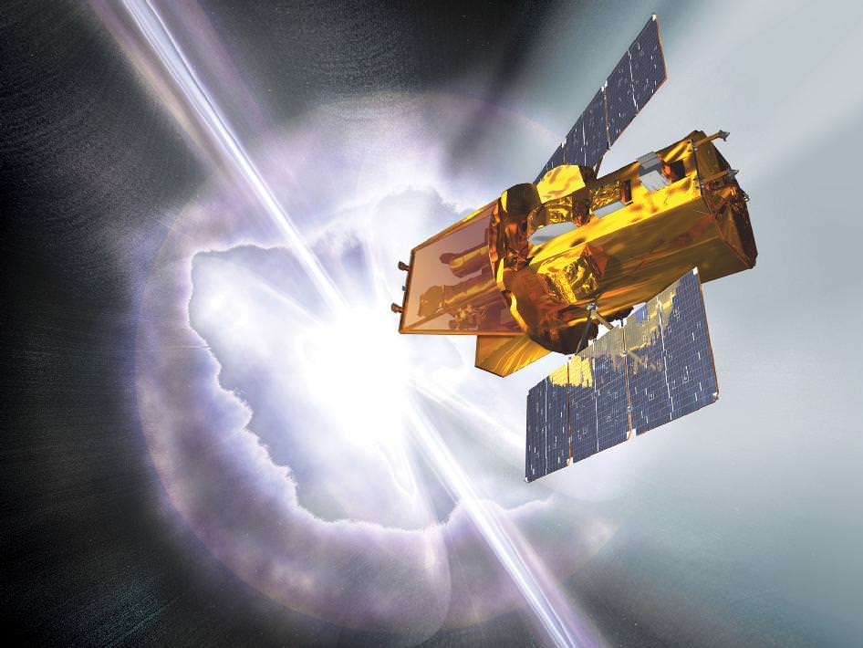 Artist's conception of the SWIFT satellite in the act of capturing a gamma-ray burst. Credit: NASA