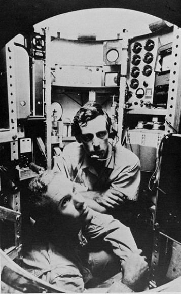 Lt. Don Walsh, USN (left) and Jacques Piccard (centre)
in the bathyscaphe Trieste. Via Wikipedia. 