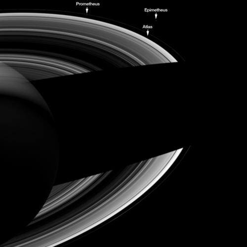 Saturn, its rings and three moons are visible in this image from Cassini. Credit: NASA/ESA