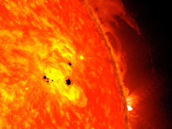 This image of AR 1678 combines images from two instruments on NASA's Solar Dynamics Observatory (SDO): the Helioseismic and Magnetic Imager (HMI), which takes pictures in visible light that show sunspots and the Advanced Imaging Assembly (AIA), which took an image in the 304 Angstrom wavelength showing the lower atmosphere of the sun, which is colorized in red. Credit: NASA/SDO/AIA/HMI/Goddard Space Flight Center
