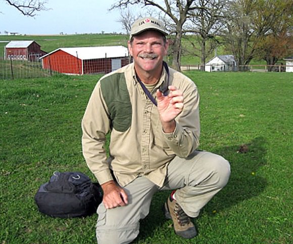 Greg Hupe, renowned meteorite hunter, wears a big smile after finding a fresh 33.7g meteorite of the Mifflin, Wis. fall in 2010. Credit: Greg Hupe