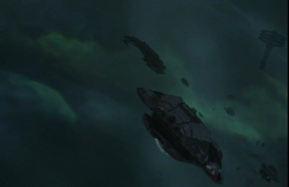 Those bright colors surrounding Battlestar's ships are not actually what you would see if nestled in a nebula, according to  Harvard astronomer. Credit: Battlestar Galactica/SciFi (screencap)