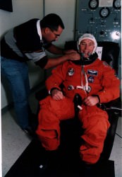 Jerry Ross suits up for the STS-74 mission in 1995. Credit: NASA.