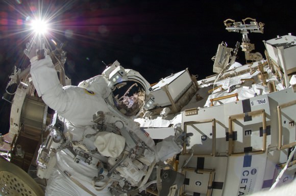 Sunita Williams appears to touch the sun during this spacewalk on Expedition 35 on the completed International Space Station. Credit: NASA