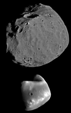 Phobos (above) and Diemos (bottom) closeup; no Martian construction projects noted. (Credit: NASA).
