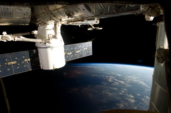 Dragon attached to the International Space Station during the CRS-2 mission. Credit: NASA.