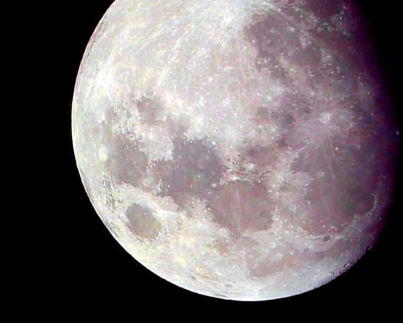 A false-colored gibbous Moon enhanced to bright out subtle color. (Photo by author).