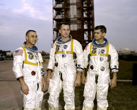 Apollo 1 astronauts (from left) Virgil "Gus" Grissom, Edward White and Roger Chaffee stand near Cape Kennedy's Launch Pad 34 during training. Credit: NASA