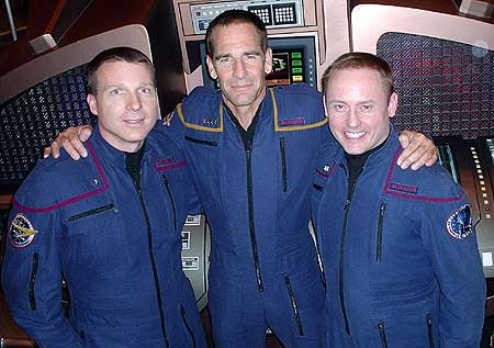 Astronaut Terry Virts, left, Actor Scott Bakula and Astronaut Mike Fincke, right, beam on the set of Star Trek's final Enterprise voyage. Credit: NASA