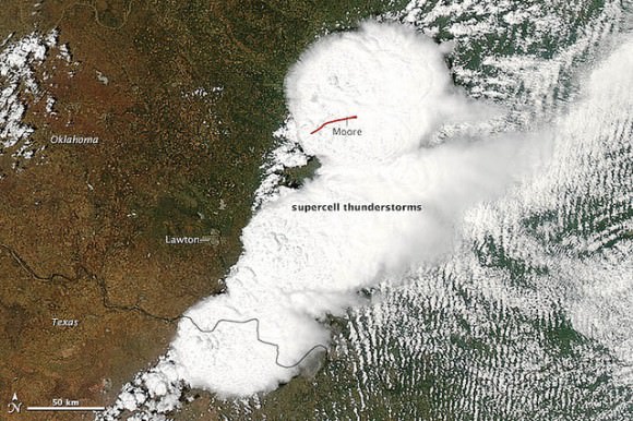 Satellite view of the destructive tornado that passed just south of Oklahoma City. The Moderate Resolution Imaging Spectroradiometer (MODIS) on NASA’s Aqua satellite acquired this image of the storm at 2:40 p.m. local time (19:40 UTC) on May 20, 2013. Credit: NASA image courtesy Jeff Schmaltz, LANCE/EOSDIS MODIS Rapid Response Team at NASA GSFC. 