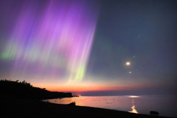 The crescent moon, Jupiter and Venus accompanied a spectacular aurora over Lake Superior in Duluth, Minn. last July. Credit: Bob King